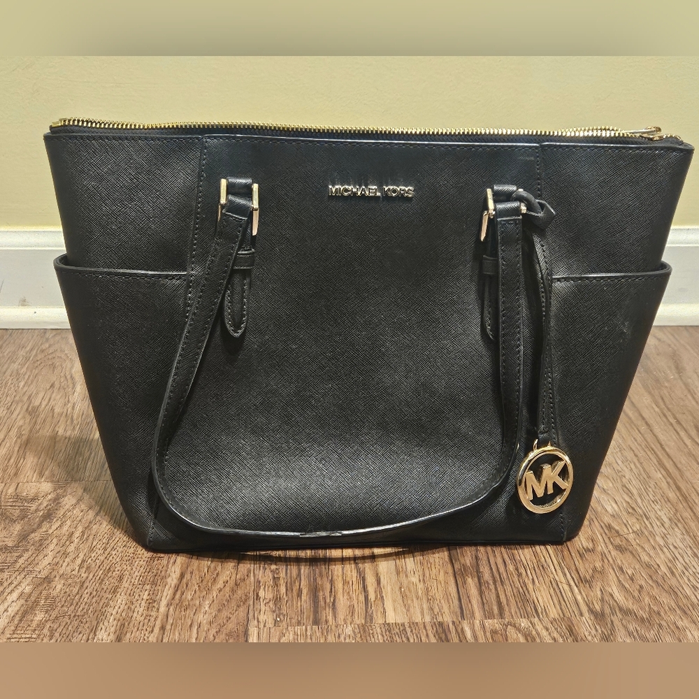 Michael Kors Elegant Black Tote with Gold Accents